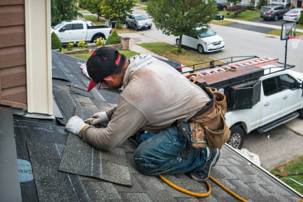 Professional Roof Replacement technician working in Hudson, NY